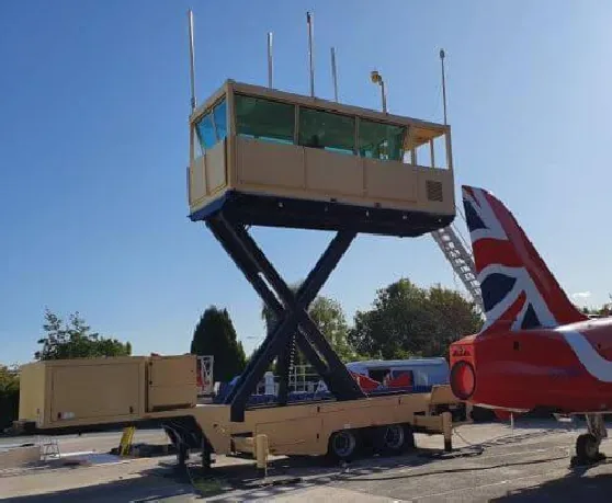 ATC cabin raised on a scissor-lift vehicle